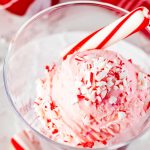 Close up photo of peppermint ice cream in a glass ice cream dish.