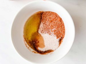 BBQ seasoning, salt, and oil in a small dish.