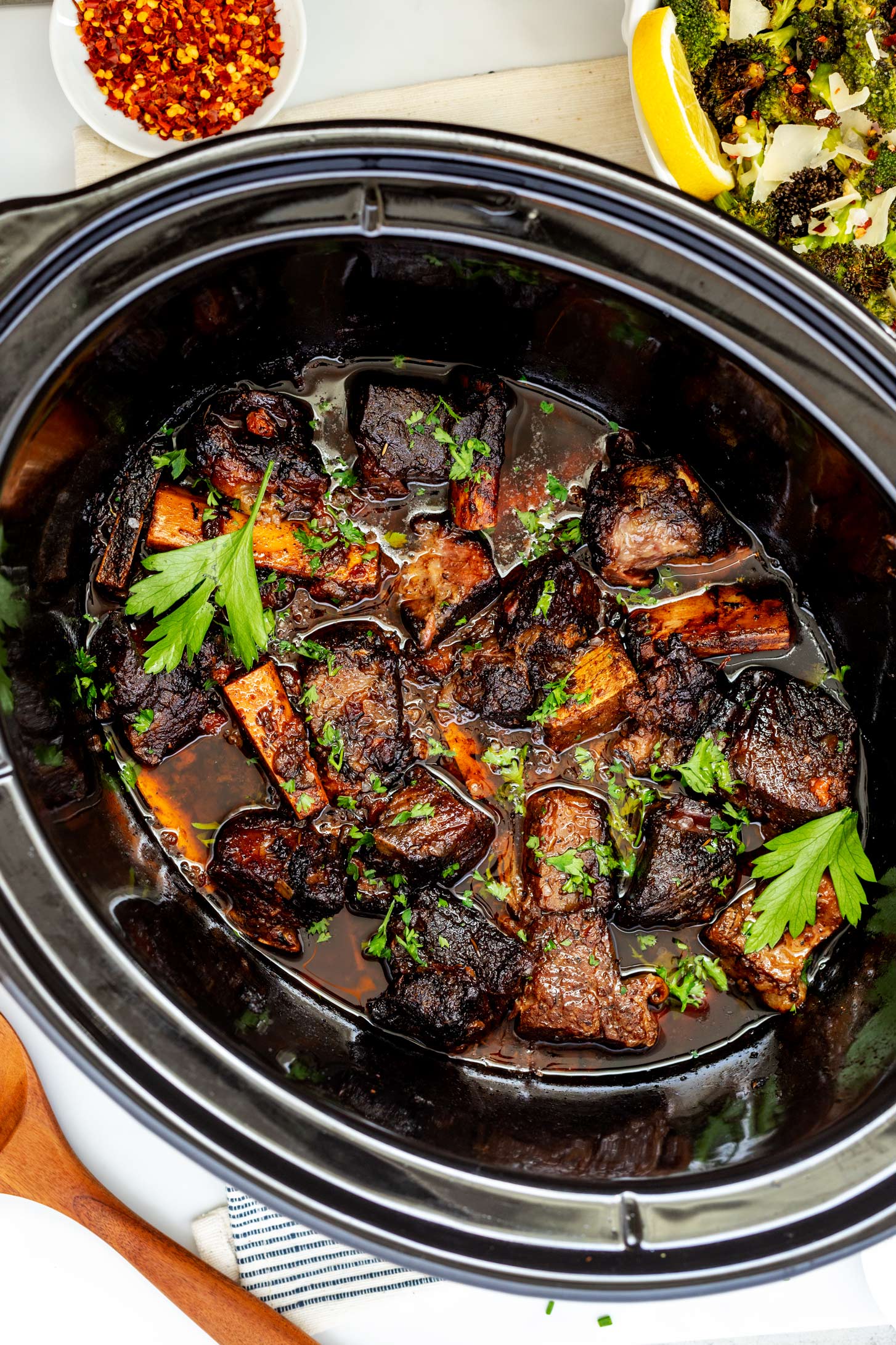 Overhead photo of slow cooker short ribs in a crockpot.