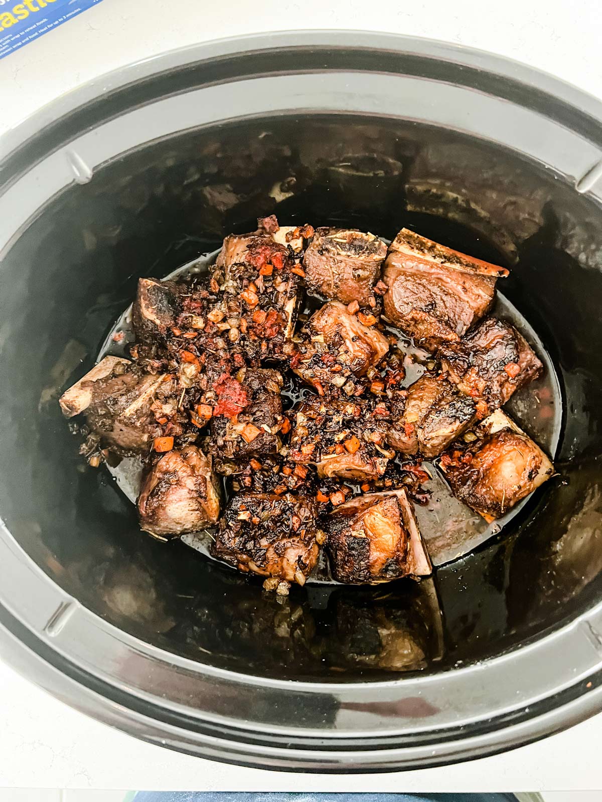 Slow cooker beef ribs ready to cook.