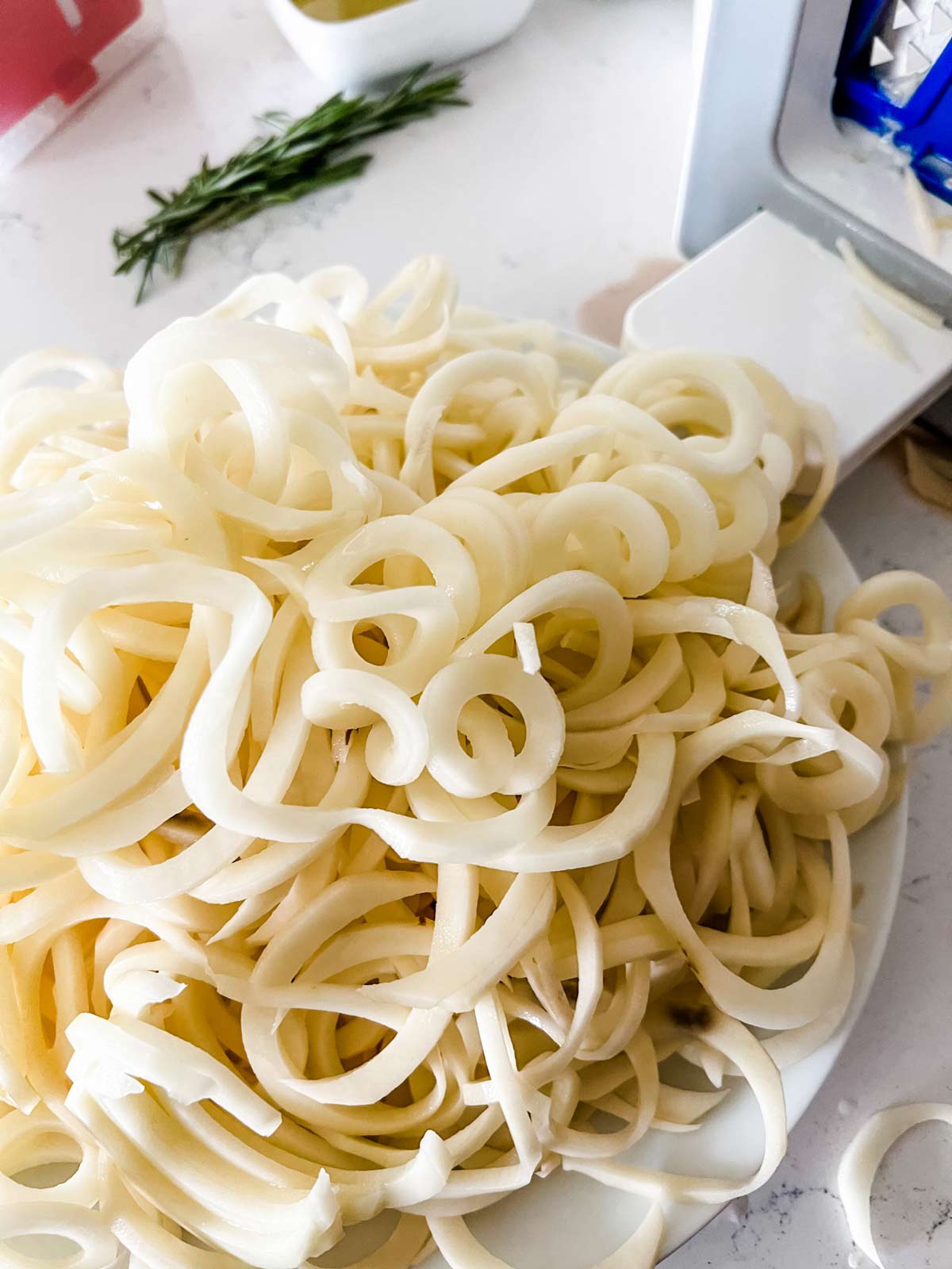 Spiralized potatoes on a plate.