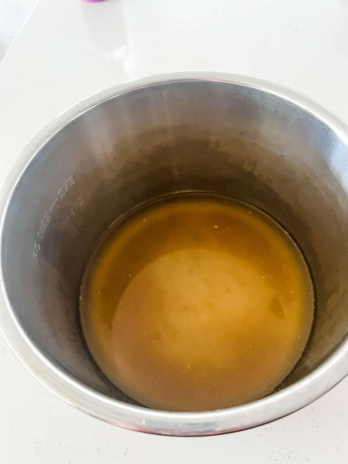 Broth in the inner pot to an Instant pot.