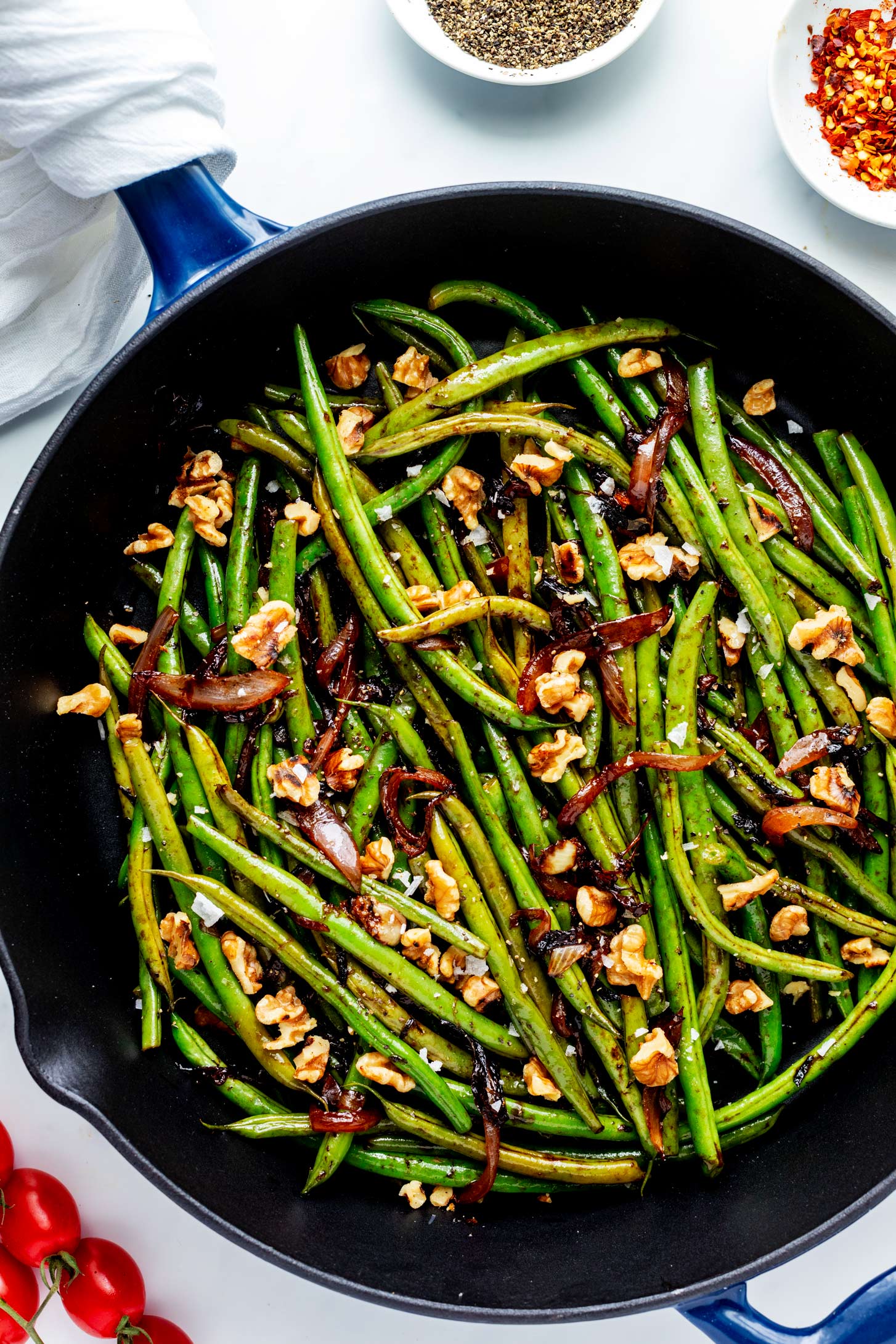 Overhead photo of skillet balsamic green beans in an enameled cast iron skillet.