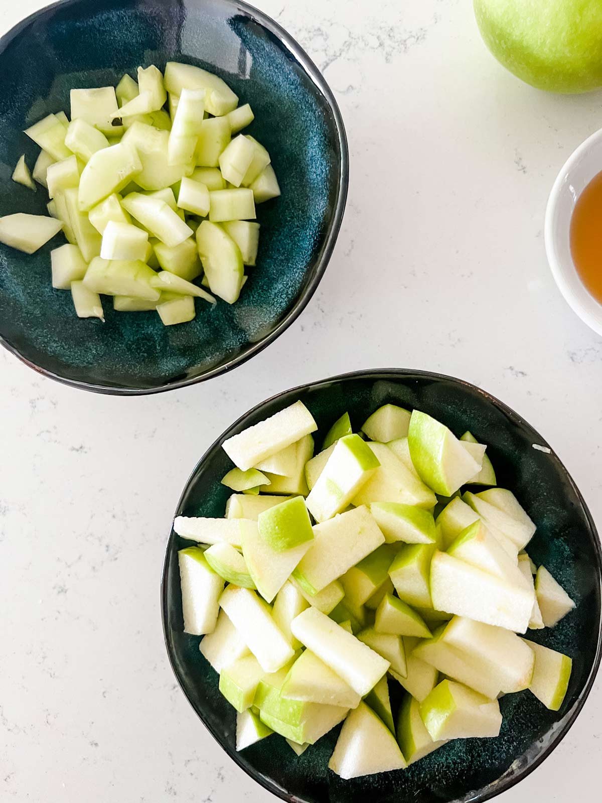 Chopped apple and chopped cucumber.