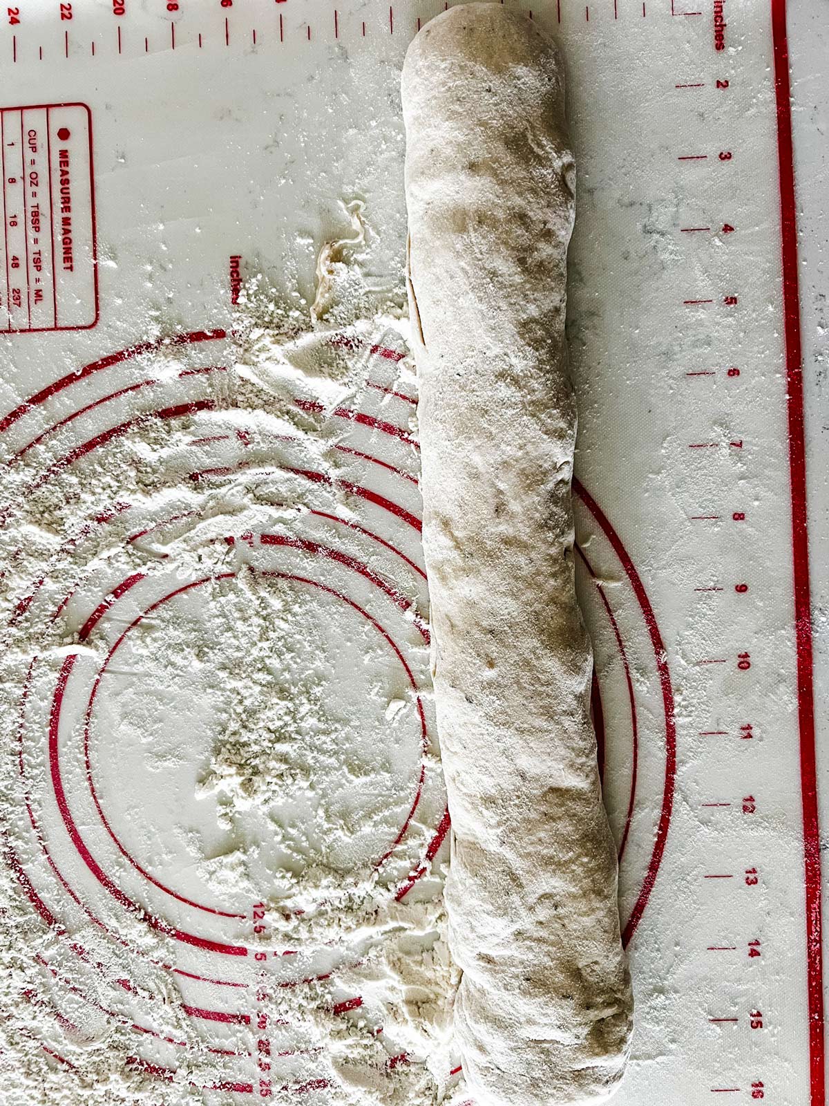 Bread dough rolled into a cylinder.