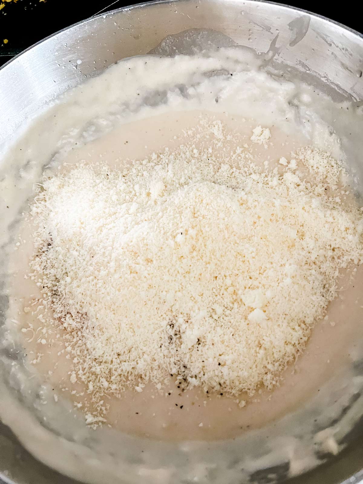 Garlic parmesan sauce that has just had the cheese added.