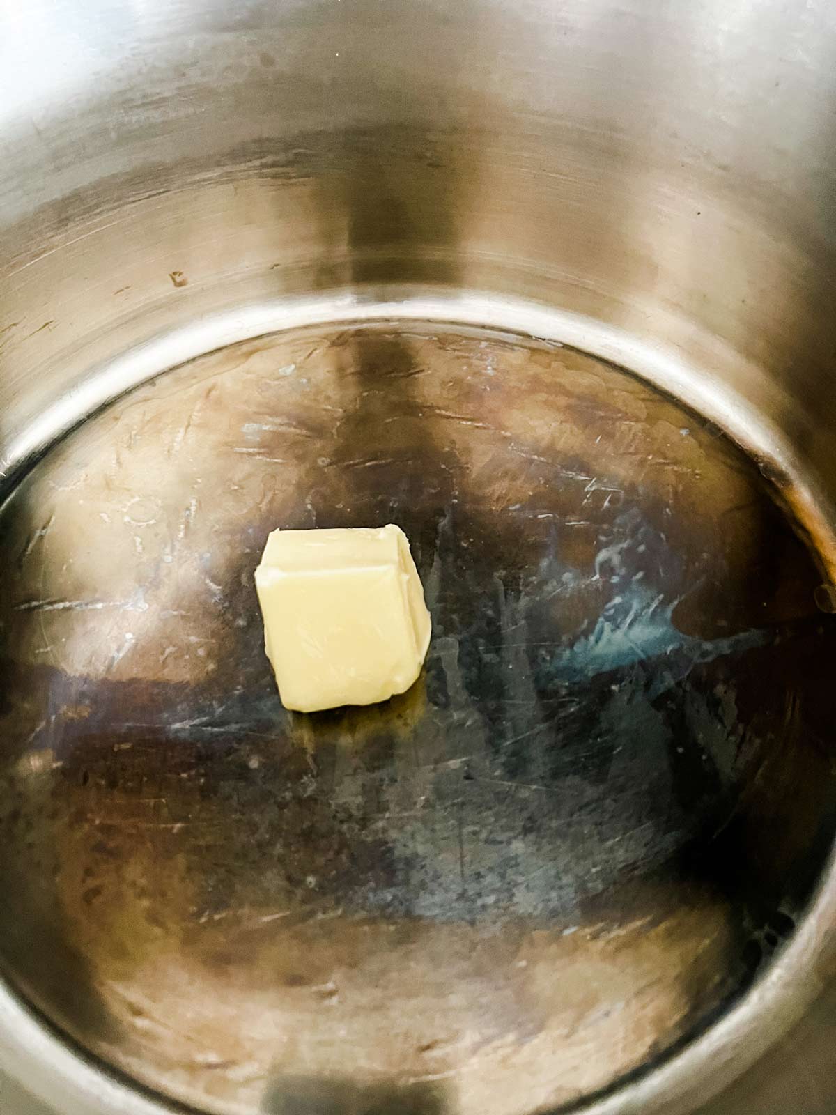 Butter in a large pot.