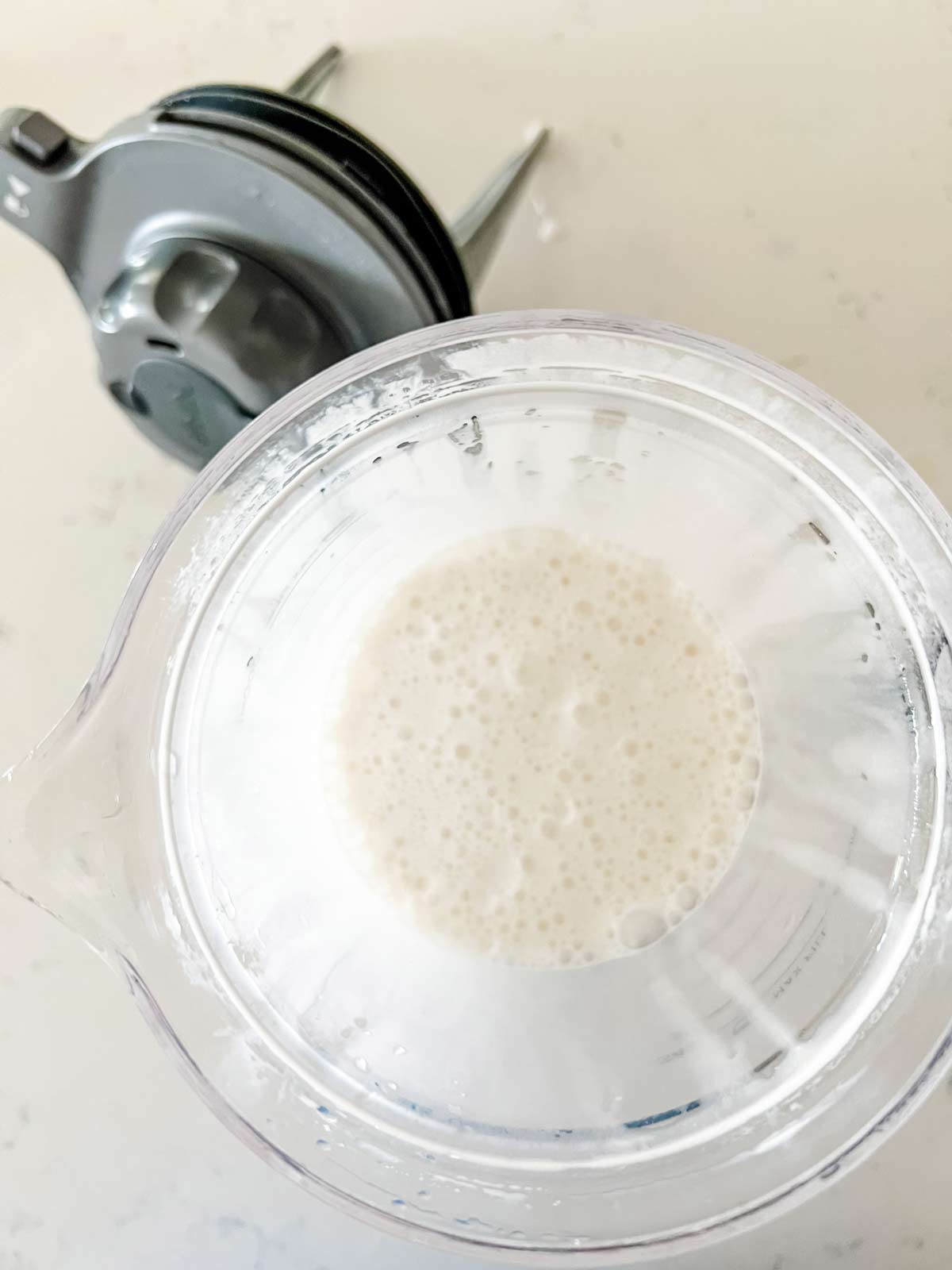Vanilla ice cream base that has just been processed in a blender.