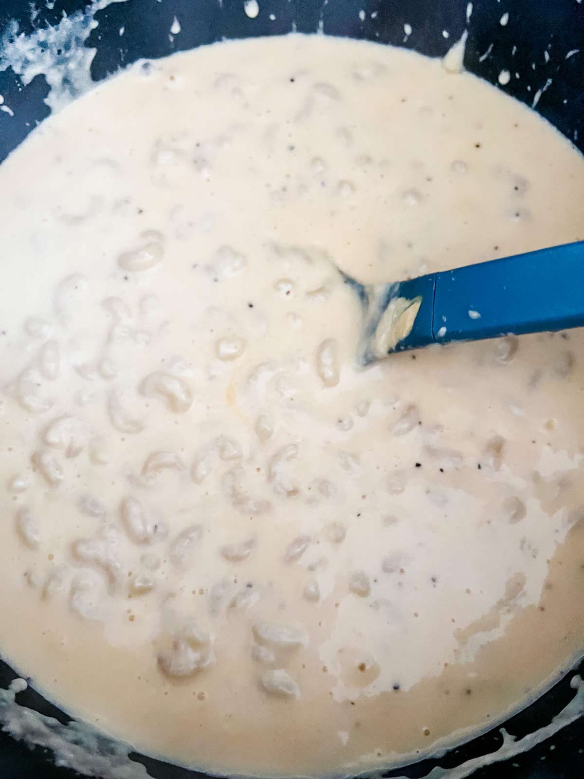 Gouda mac and cheese in a large skillet.