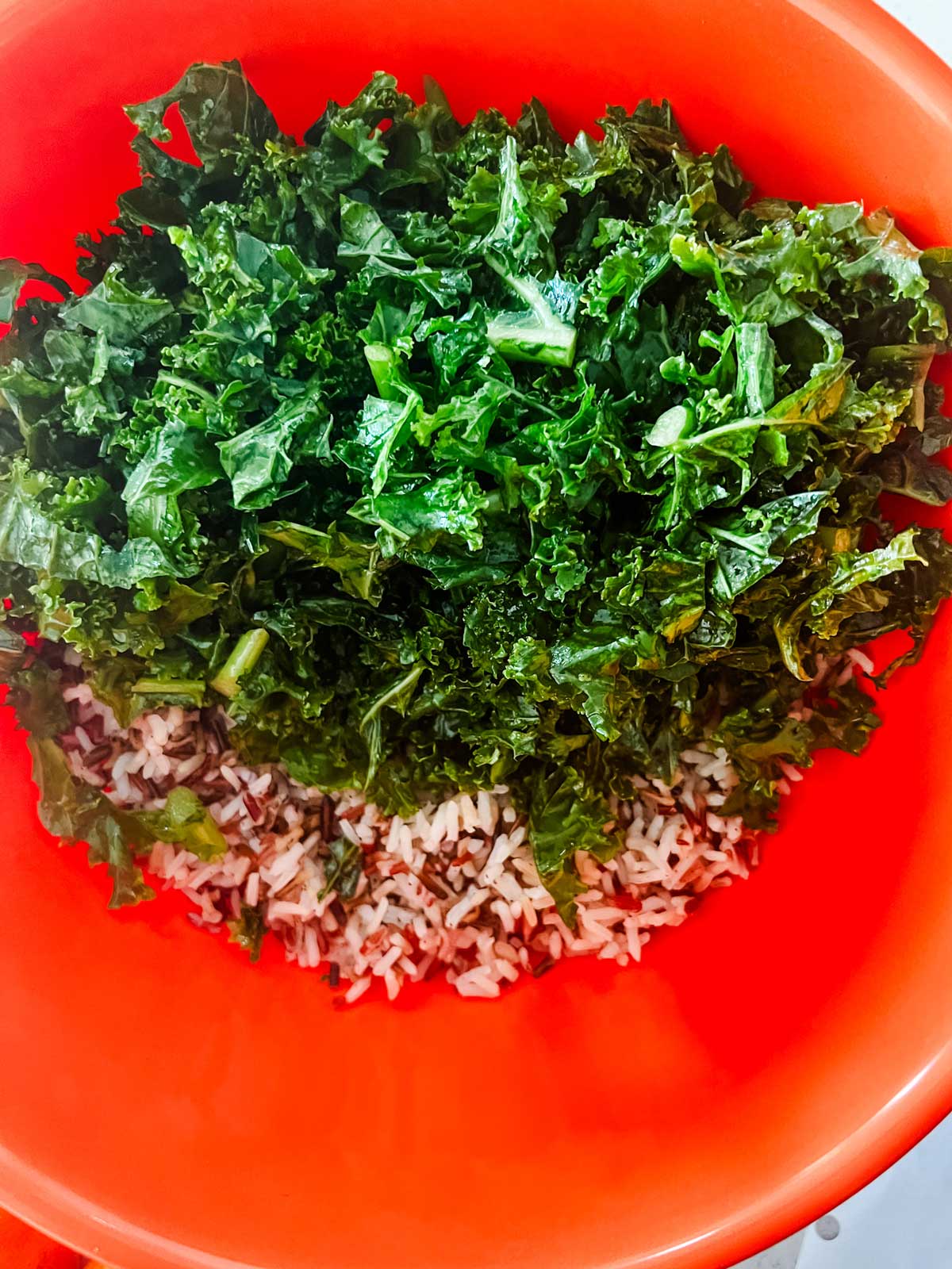 Wild rice and kale in a bowl.