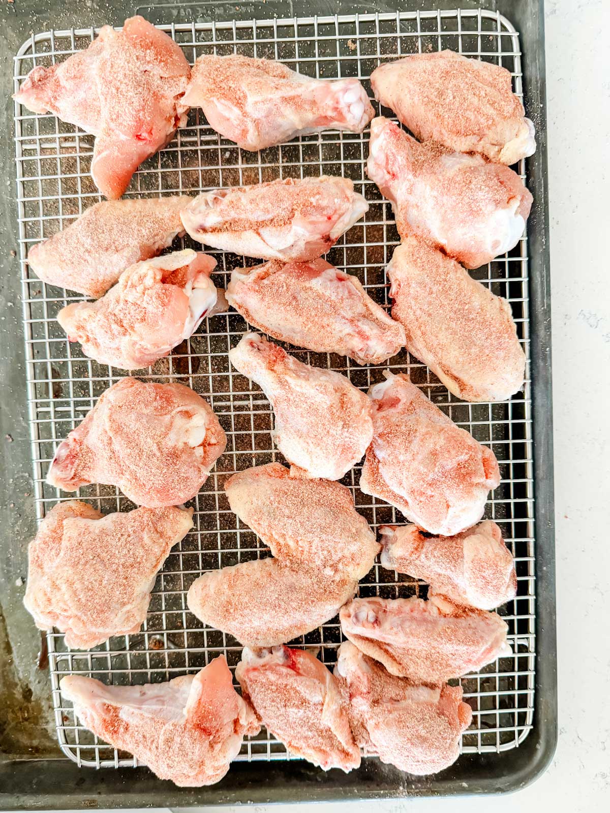 Seasoned chicken wings ready to cook.