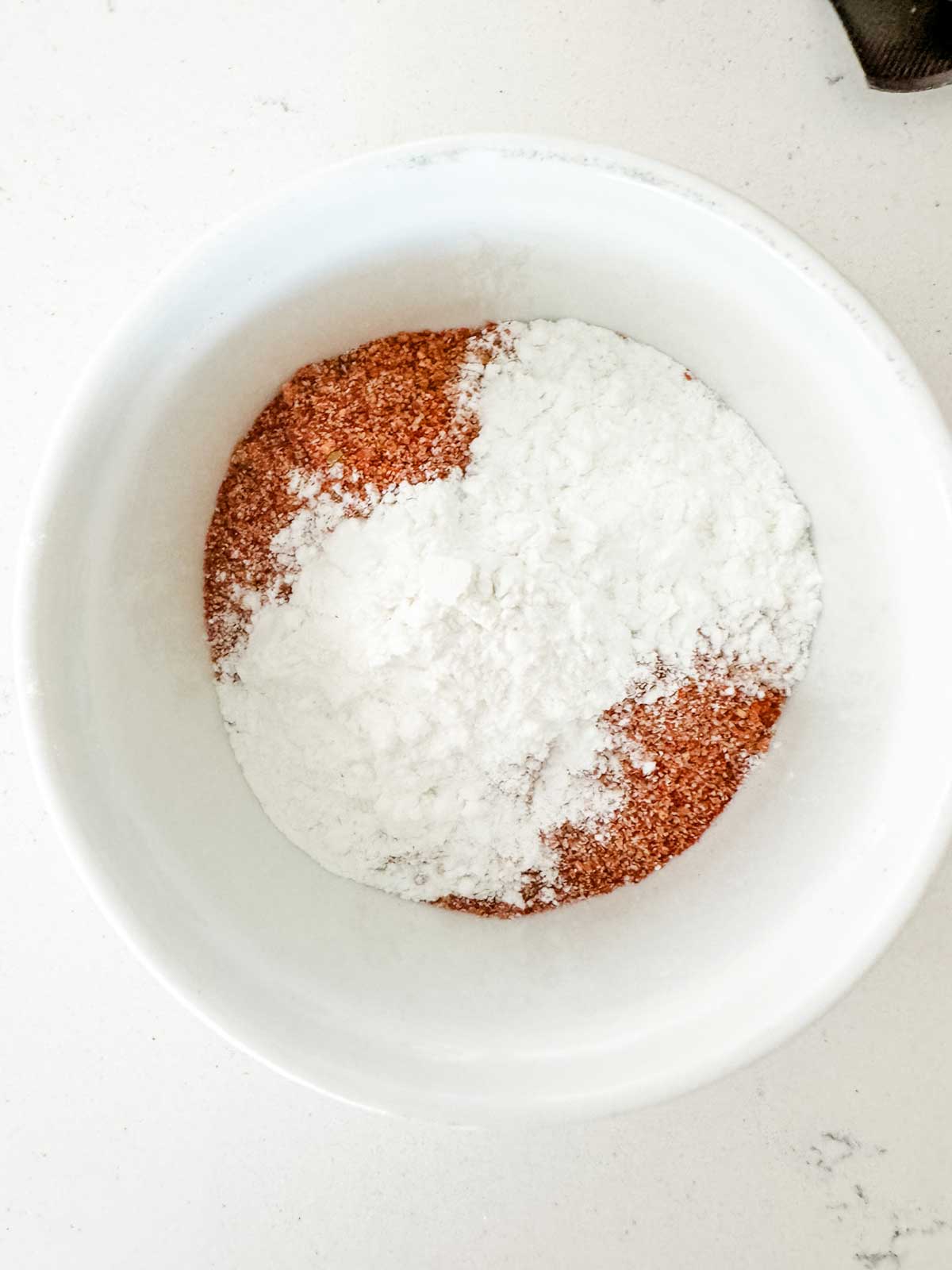 Baking soda and seasonings in a small bowl.