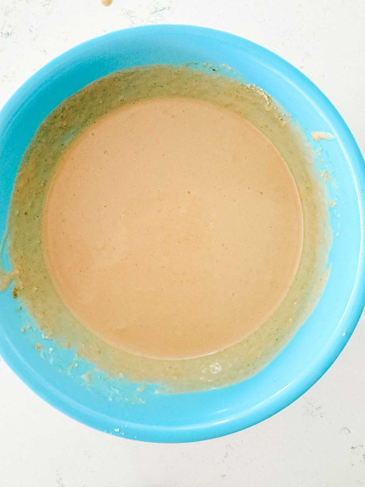 Mayonnaise, heavy cream, soy sauce, sesame oil, dry mustard, brown sugar, and Worcestershire sauce mixed together to make a creamy mustard sauce.