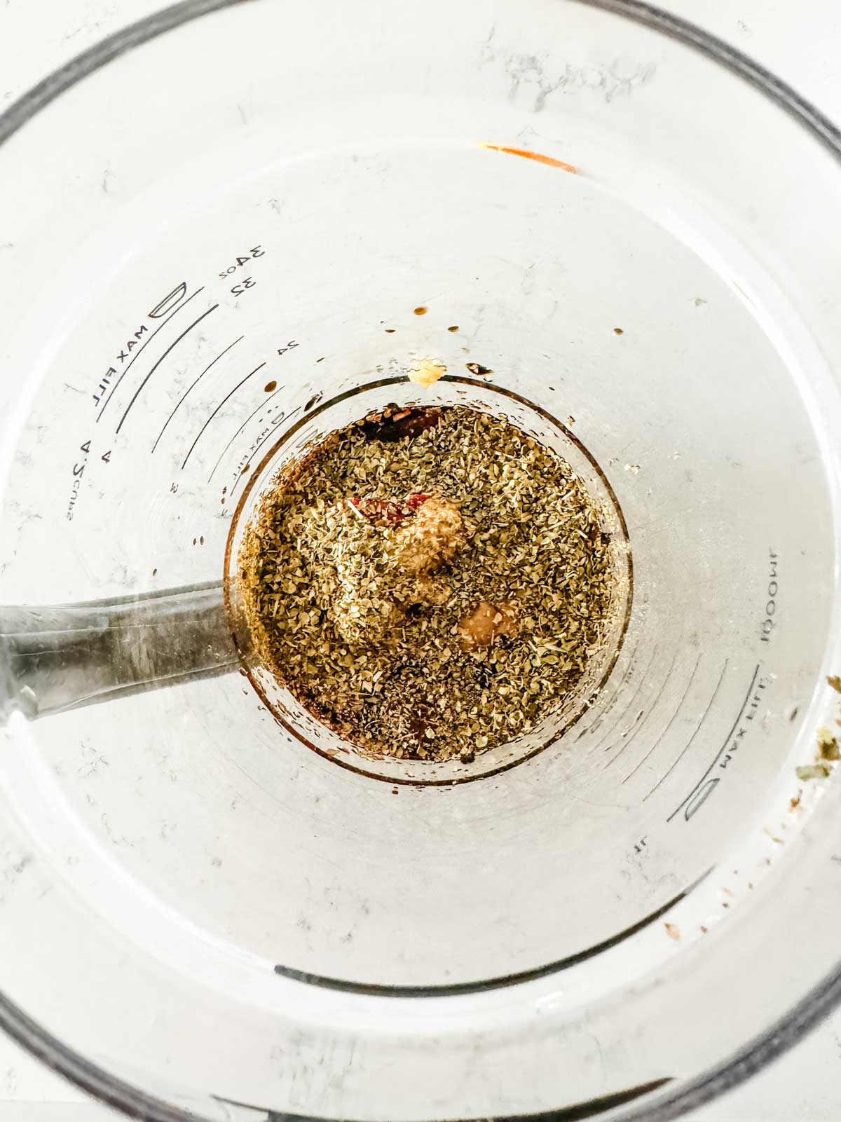 Photo of 
Soy sauce, Worcestershire sauce, brown sugar, mustard, tomato place, garlic, and oregano in a blender.