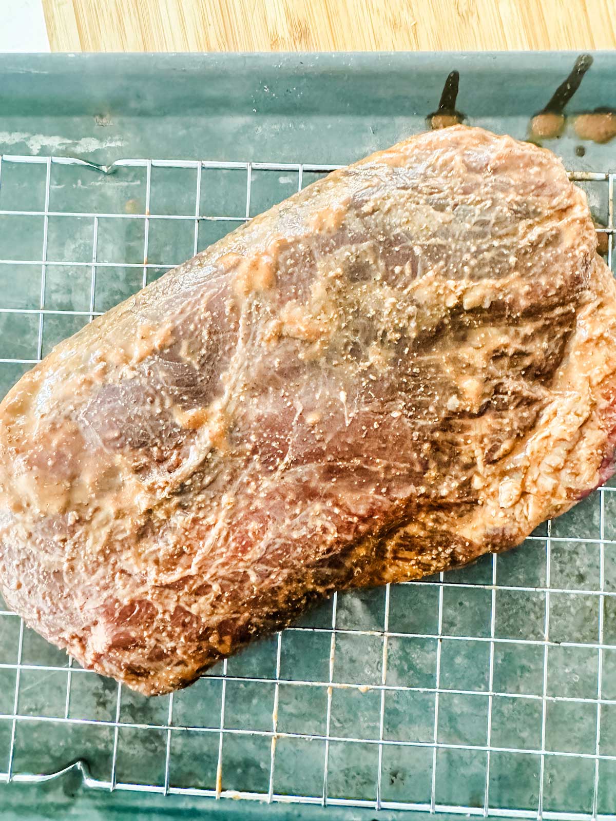 Marinated flank steak ready to cook.